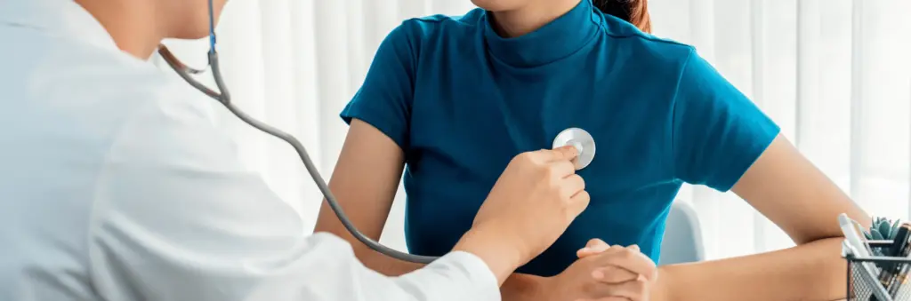 Woman checking heart