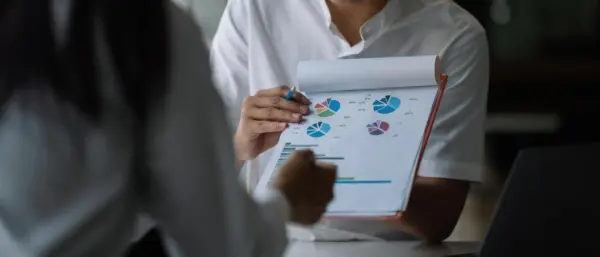 Female Doctor comparing charts or lab results